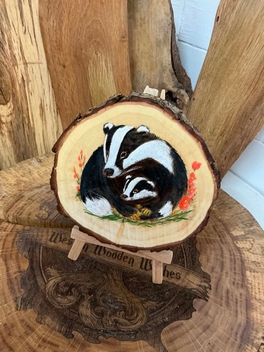 Badger beautifully laser engraved and hand painted in a slice of willow with stand