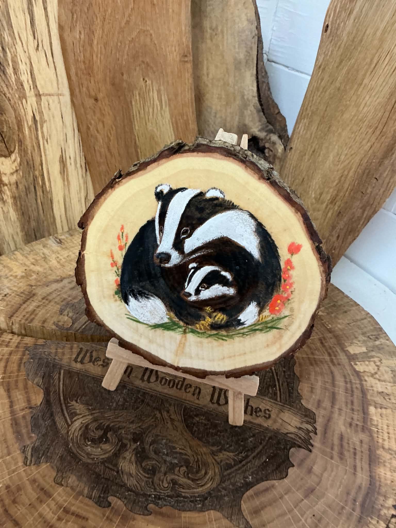 Badger beautifully laser engraved and hand painted in a slice of willow with stand