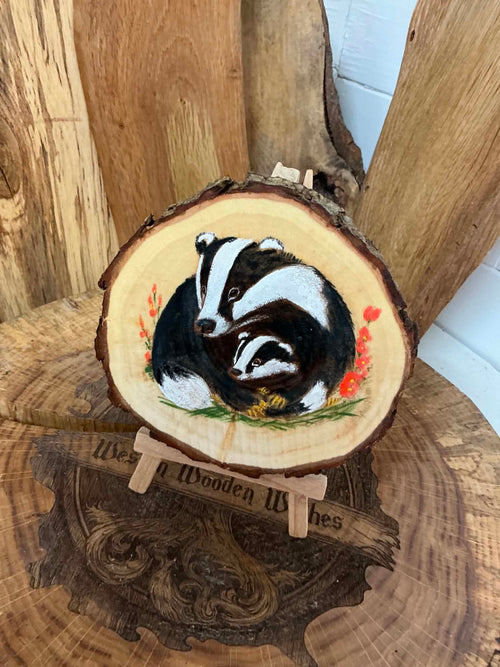 Badger beautifully laser engraved and hand painted in a slice of willow with stand