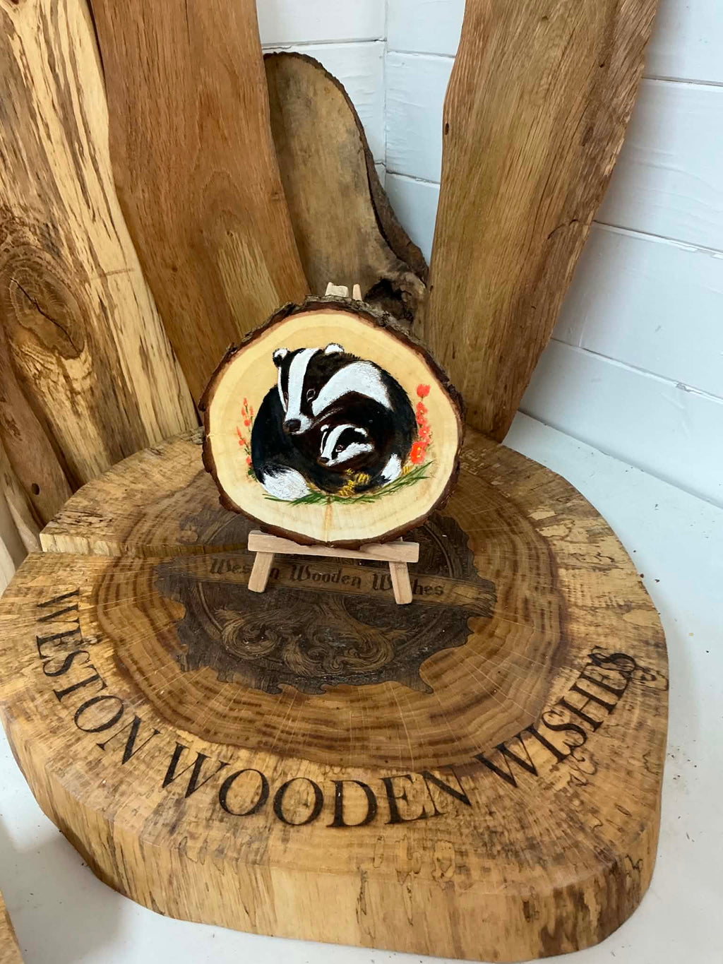 Badger beautifully laser engraved and hand painted in a slice of willow with stand