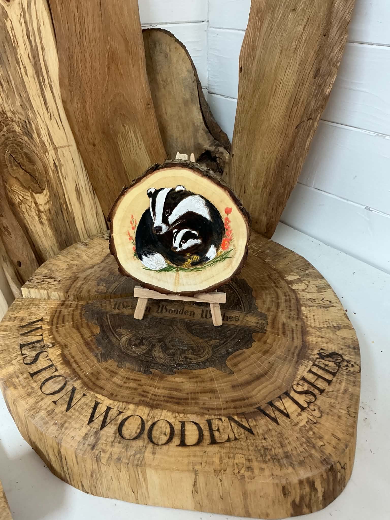 Badger beautifully laser engraved and hand painted in a slice of willow with stand