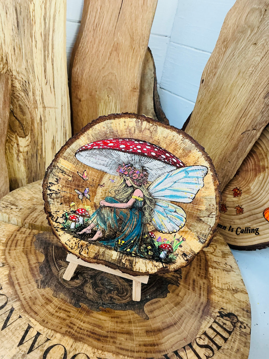 Whimsical fairy laser engraved and hand painted into a beautiful piece of spalted oak