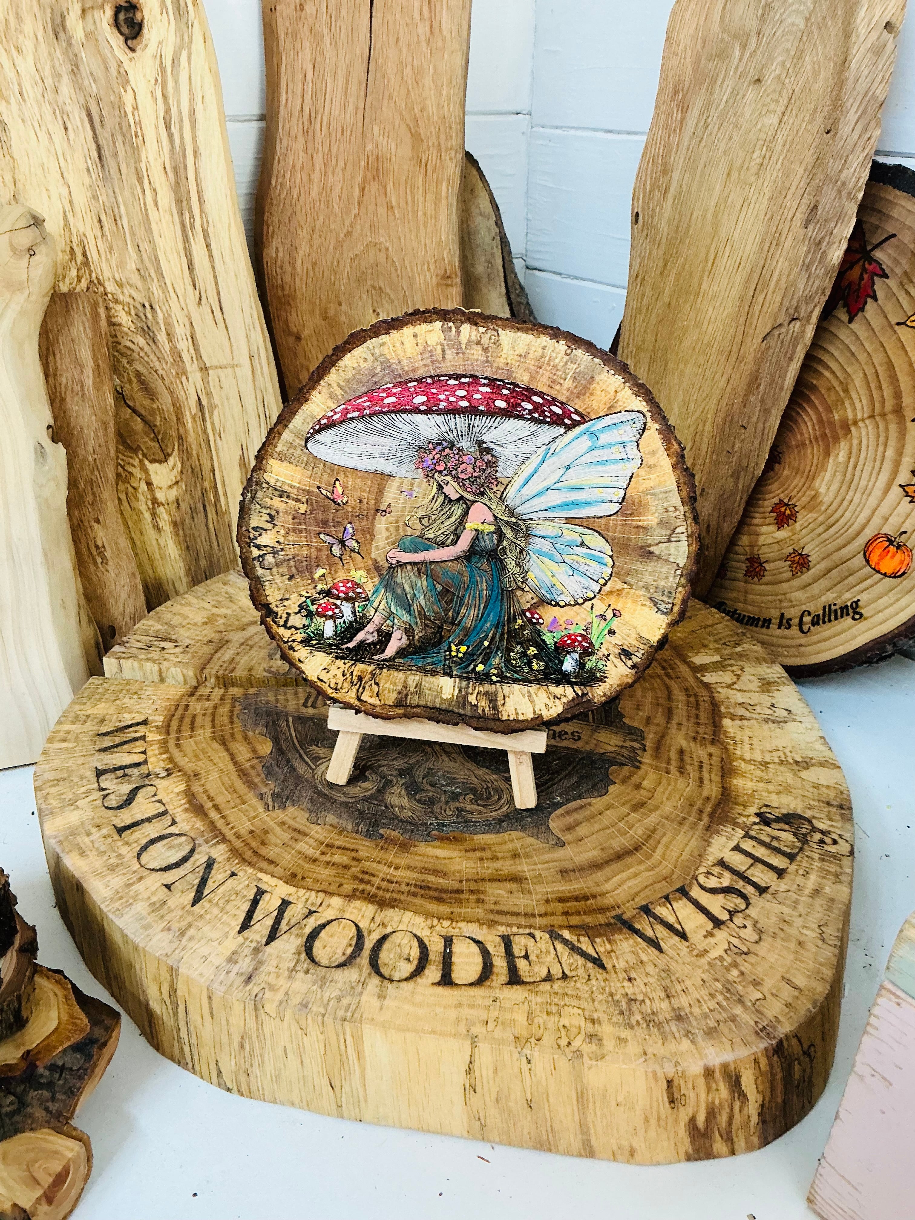 Whimsical fairy laser engraved and hand painted into a beautiful piece of spalted oak