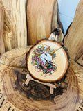 Unicorn laser engraved , hand painted onto a slice of willow with stand
