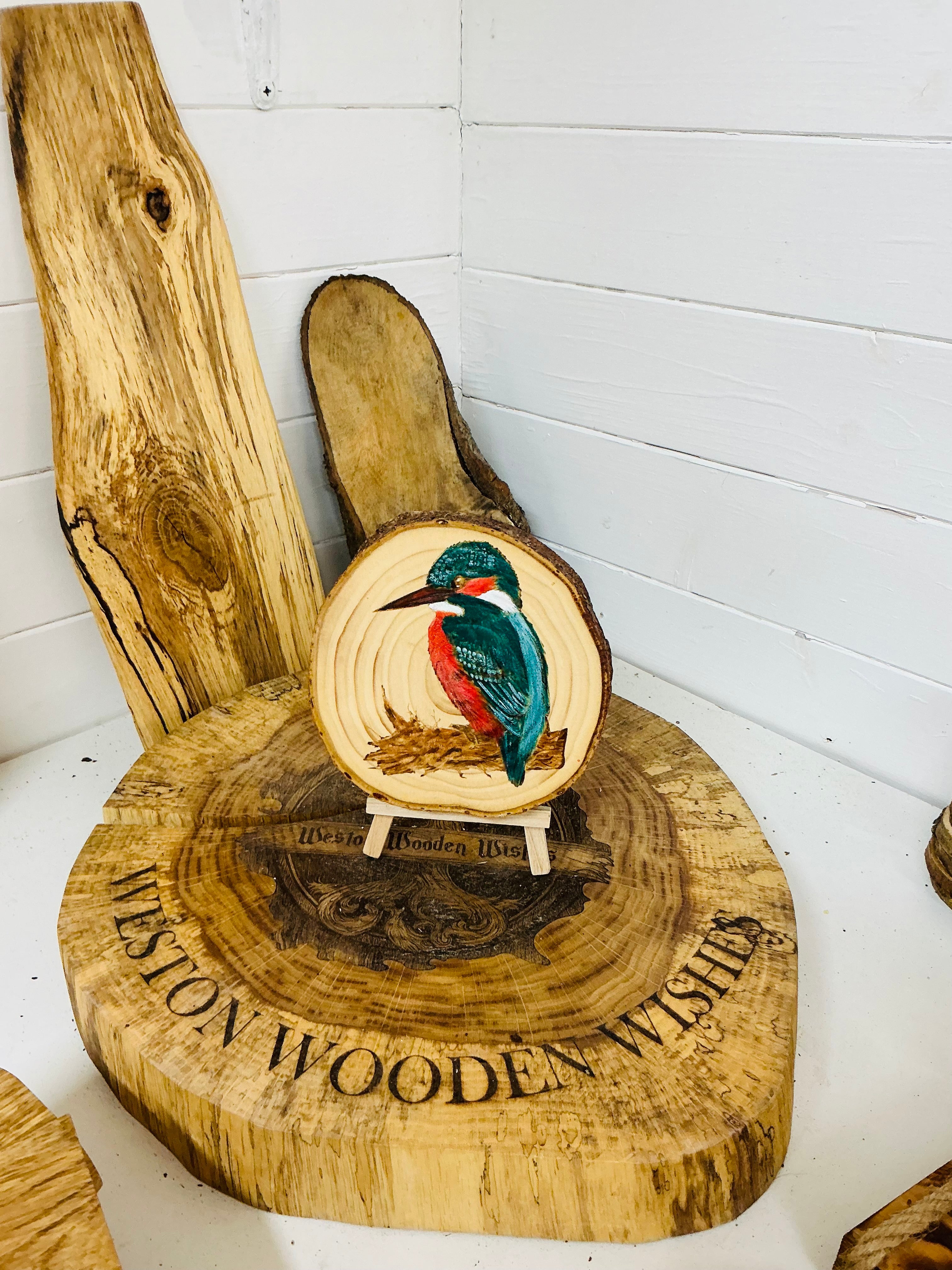 Kingfisher beautifully laser engraved and hand painted onto a log slice