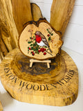 Ornate log slice with beautifully laser engraved and hand painted Robin with stand