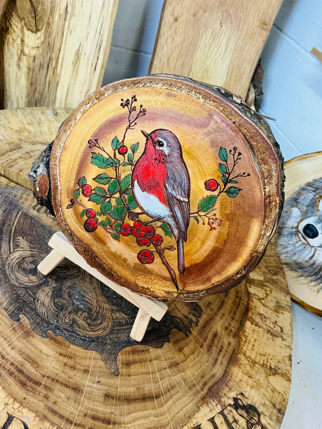 Robin Red Breast hand painted onto log a slice of cherry wood