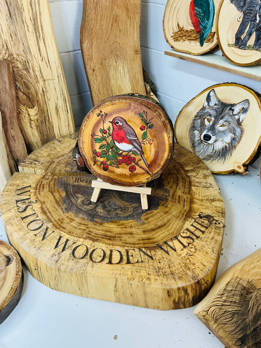 Robin Red Breast hand painted onto log a slice of cherry wood