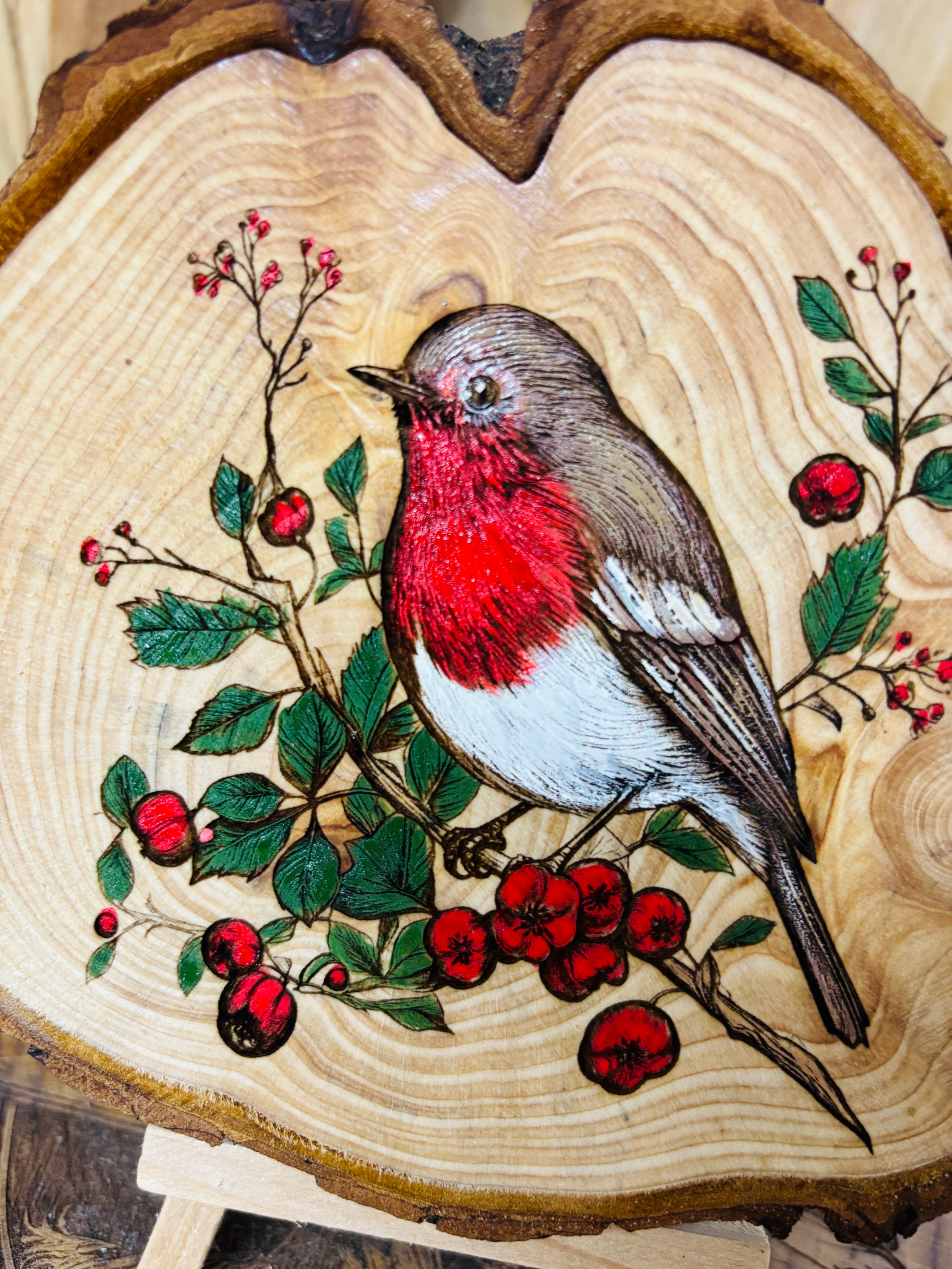 Ornate log slice with beautifully laser engraved and hand painted Robin with stand