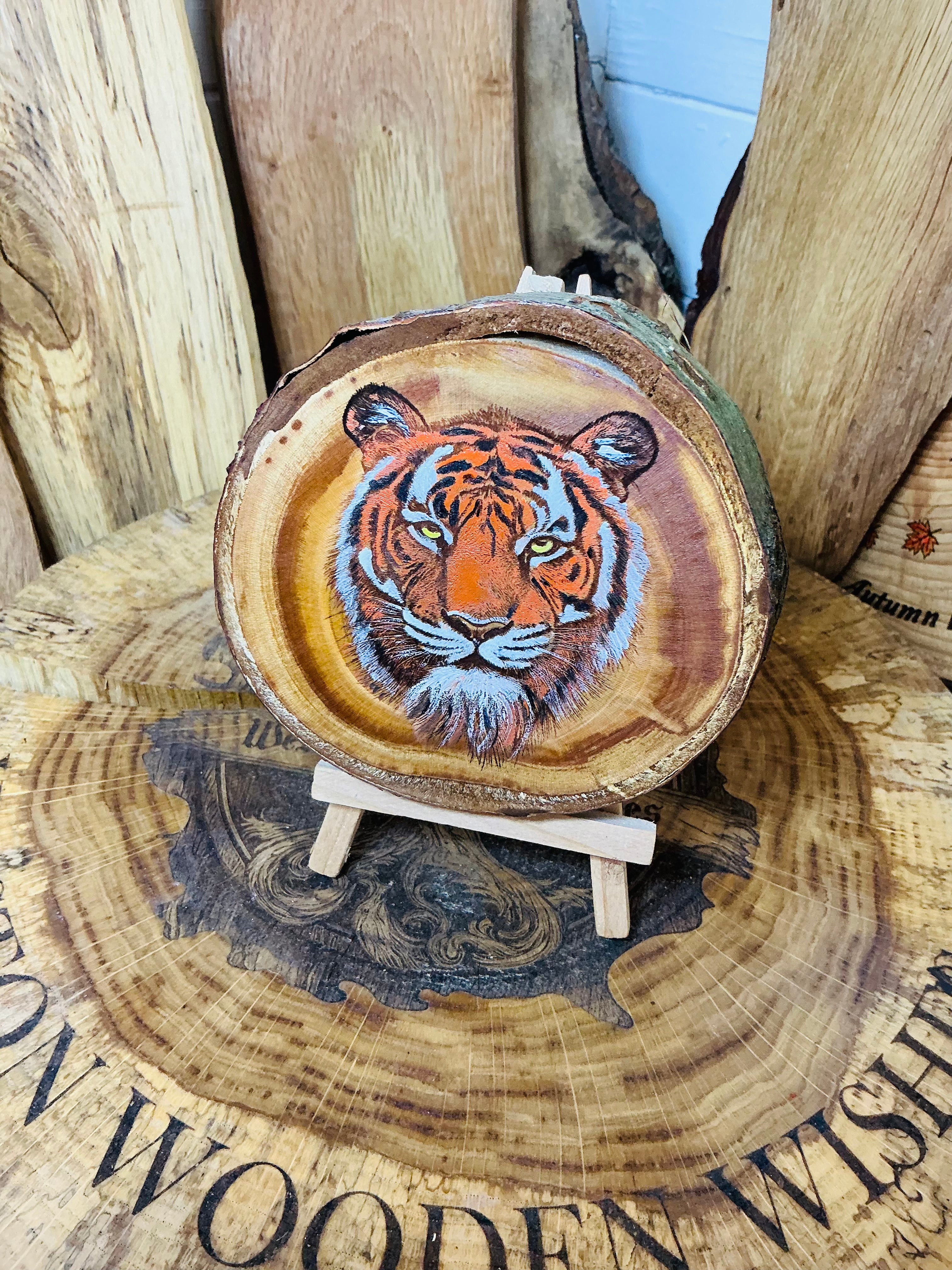 Majestic tiger laser engraved and hand painted onto a slice of cherry wood with stand