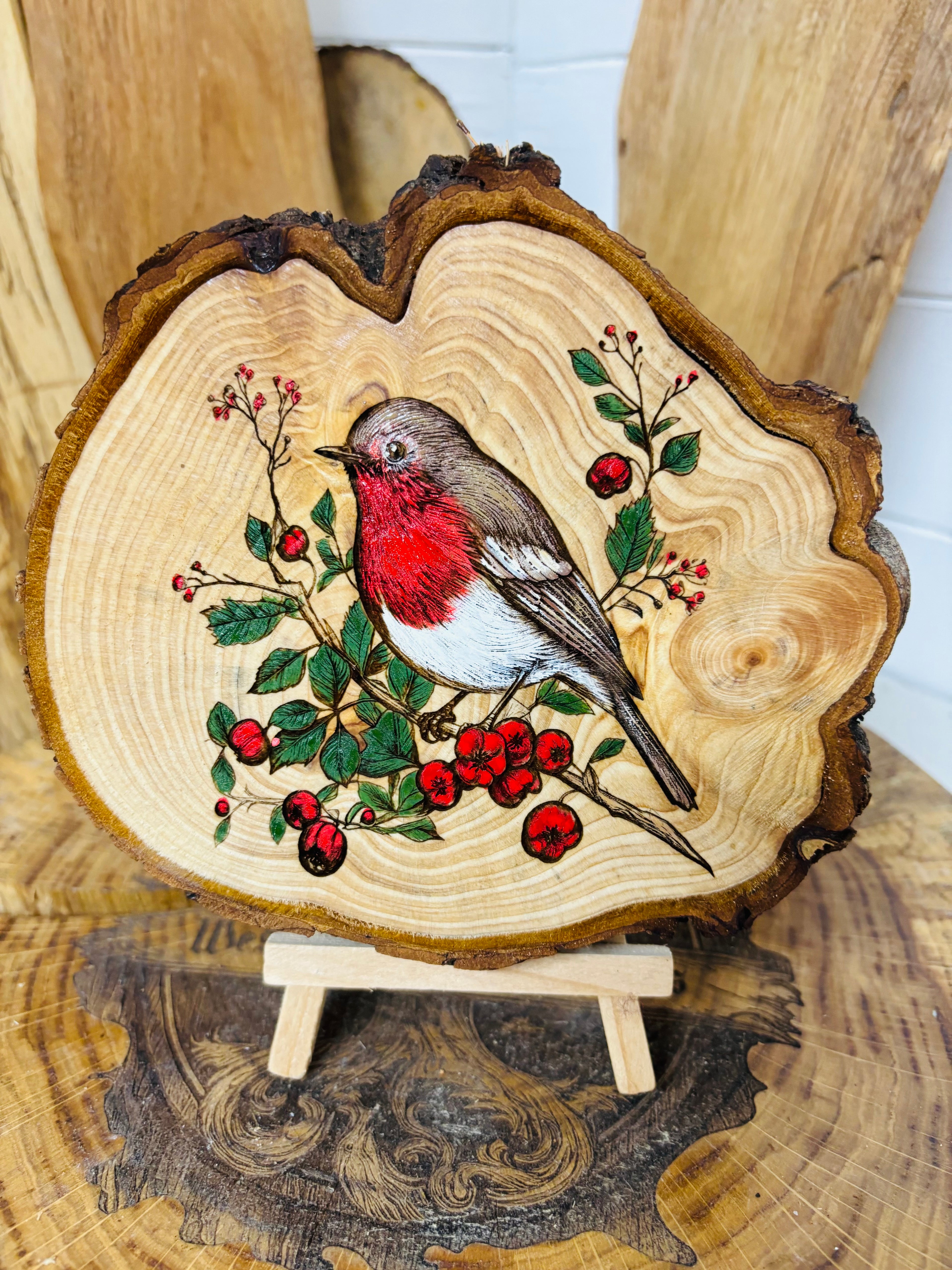 Ornate log slice with beautifully laser engraved and hand painted Robin with stand