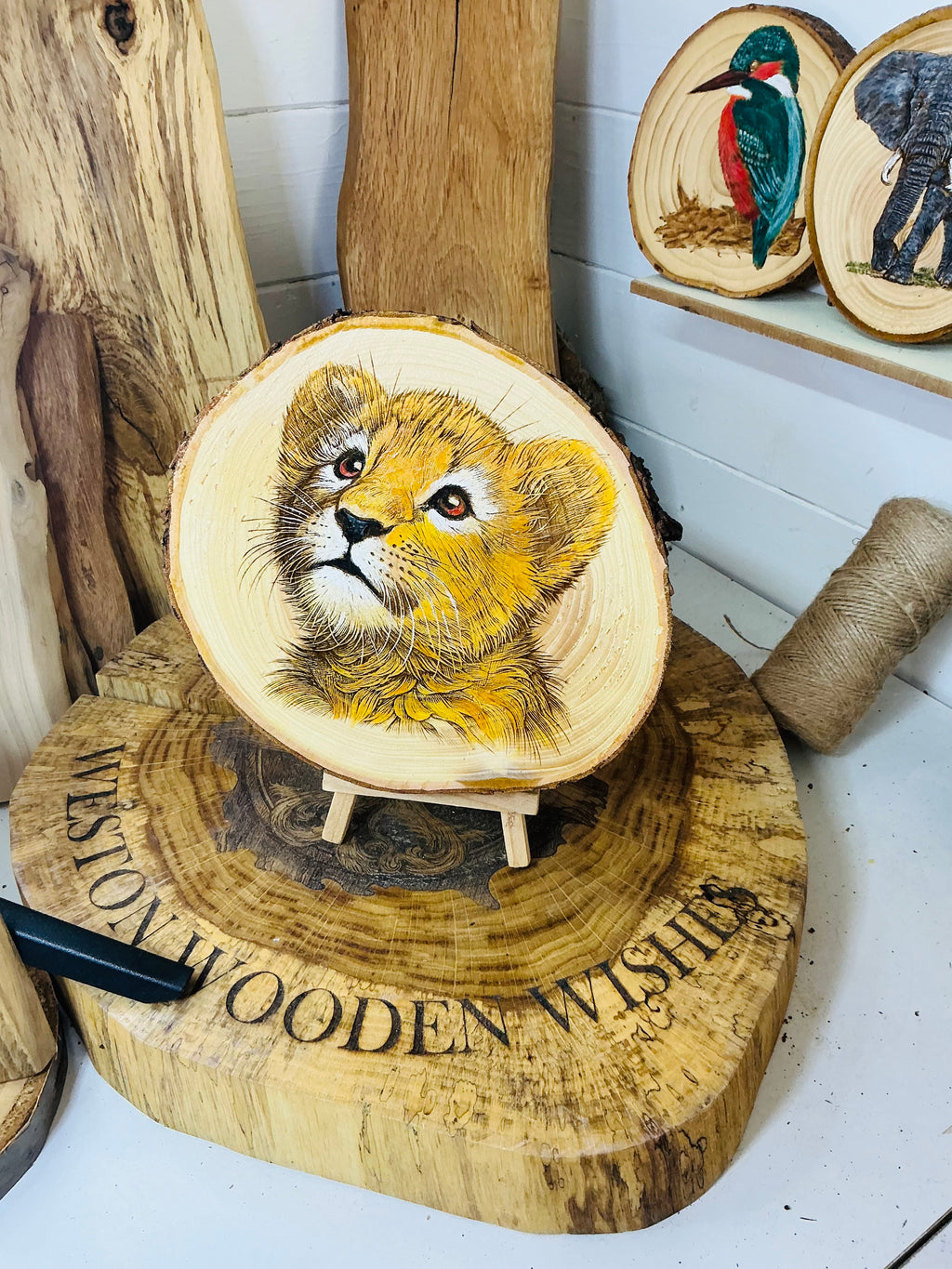 Lion Cub laser engraved and hand painted onto large log slice with stand