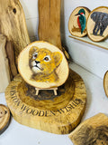 Lion Cub laser engraved and hand painted onto large log slice with stand